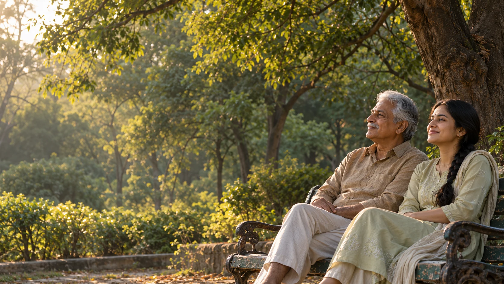 Illustrative scene of an older man and his adult daughter enjoying a quiet moment together in a park.